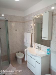 Koupelna v ubytování Apartments Vodarić Loznati