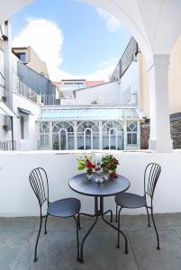Balkon lub taras w obiekcie Stylische Cityapartments Benedikt