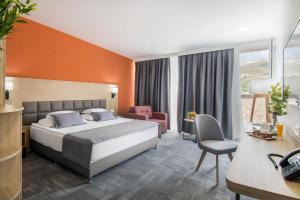 Postel nebo postele na pokoji v ubytování Hotel Split Inn by President + 19 fotografií