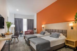 Postelja oz. postelje v sobi nastanitve Hotel Split Inn by President