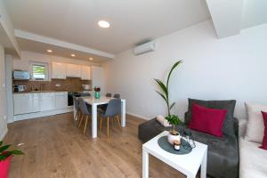 Kuchyň nebo kuchyňský kout v ubytování Apartman Macan