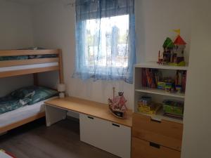เตียงในห้องที่ Ferienwohnung Weizblick