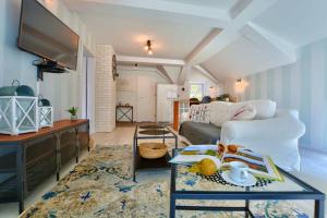 Μια τηλεόραση ή/και κέντρο ψυχαγωγίας στο Apartament Beztroski