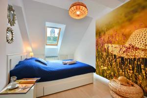 Ένα ή περισσότερα κρεβάτια σε δωμάτιο στο Apartament Beztroski