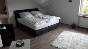 Postelja oz. postelje v sobi nastanitve Ferienwohnung Schwarzwaldglück