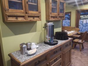 a kitchen with a counter with a blender on it at U KOMINKA in Zakopane