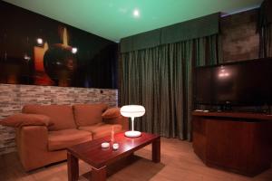 Posedenie v ubytovaní Motel Emporio