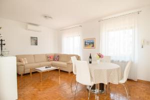 Posedenie v ubytovaní Apartments Palmic