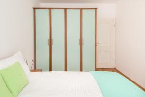 Posteľ alebo postele v izbe v ubytovaní Apartments Palmic