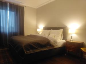 Łóżko lub łóżka w pokoju w obiekcie Srokowski Dwór 1 - Mazurski Dwór - 450m2