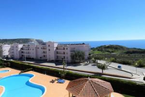 a view of a resort with a swimming pool at Vila das Acacias in Luz