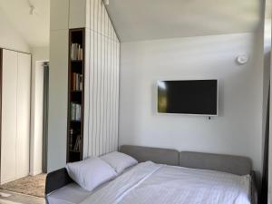 Postel nebo postele na pokoji v ubytování Utriai Guest Place