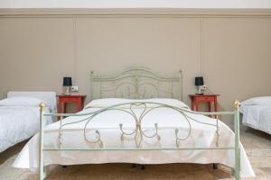 Ein Bett oder Betten in einem Zimmer der Unterkunft B&B Santi Medici