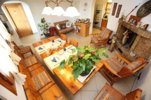 an overhead view of a living room with a table and chairs at B&B Ca' Loi in Mirano