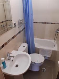 Ванна кімната в Alojamento Rita