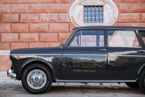a black car parked in front of a building at Paragon 700 Boutique Hotel & SPA in Ostuni