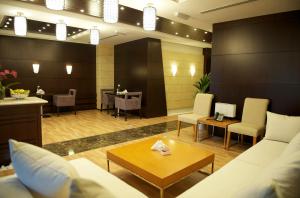 Гостиная зона в Grand Bellevue Hotel Apartment Dubai