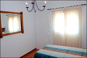 Ένα ή περισσότερα κρεβάτια σε δωμάτιο στο Apartamento Goya 7 +2 φωτογραφίες