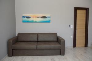 Posedenie v ubytovaní Οasis Apartments