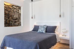 מיטה או מיטות בחדר ב-Aegean View Apartments Mykonos