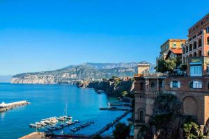 a view of a body of water with boats in it at Il Vicoletto in Pimonte