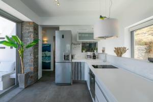 Кухня или мини-кухня в Villa Meli
