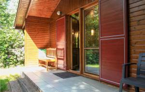 a screened in porch of a house with a patio at Beautiful Home In Neede With Wifi in Neede