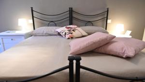 En eller flere senger på et rom på L'Iris B&B in Terrazza