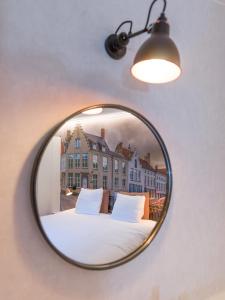 Voodi või voodid majutusasutuse Hotel Marcel toas