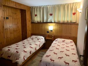 A bed or beds in a room at Appartamenti da Clara