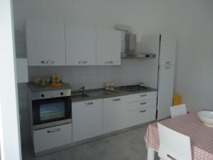 Η κουζίνα ή μικρή κουζίνα στο Appartamento Leuca