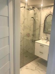 Kúpeľňa v ubytovaní Apartament Chanel Centrum