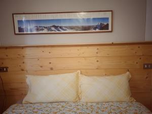 A bed or beds in a room at B&B Il Pettirosso