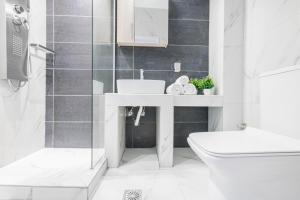 Kúpeľňa v ubytovaní Design Suites Efharis (Brusco)