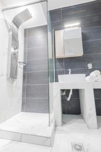 Kúpeľňa v ubytovaní Design Suites Efharis (Brusco)