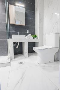 Kúpeľňa v ubytovaní Design Suites Efharis (Brusco)