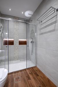 A bathroom at Adell Deluxe Apartments