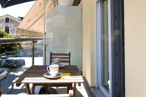 A balcony or terrace at Adell Deluxe Apartments