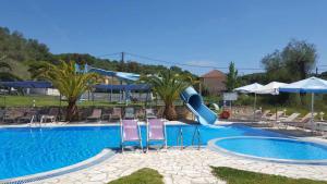 The swimming pool at or close to Pension Nychterida