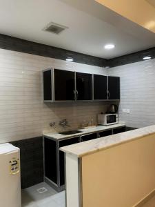 Dapur atau dapur kecil di Alshahamah Hotel Apartments