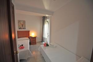 Łóżko lub łóżka w pokoju w obiekcie Playa Santa María 3 Dormitorios 2 Baños