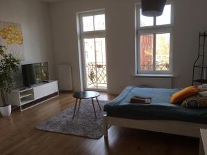 Giường trong phòng chung tại Apartament w Centrum Olsztyna +17 ảnh