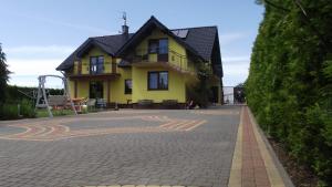 Το κτήριο όπου στεγάζεται  το δωμάτιο σε οικογενειακή κατοικία