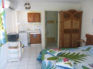 Una cocina o cocineta en Résidence des îles