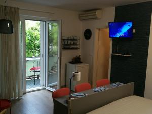 TV a/nebo společenská místnost v ubytování Rooms Beros