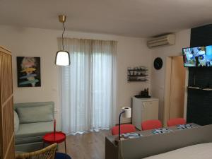 TV a/nebo společenská místnost v ubytování Rooms Beros + 24 fotografií