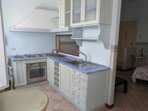A kitchen or kitchenette at D'Elite Room & Breakfast