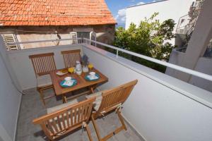 Balkón nebo terasa v ubytování Apartmani Rustica