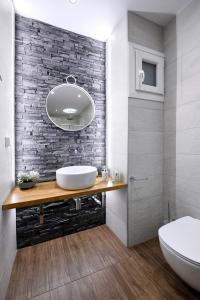 A bathroom at Adell Deluxe Apartments
