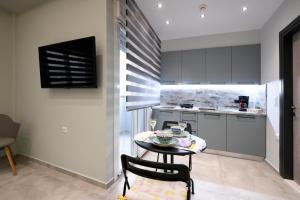 A kitchen or kitchenette at Adell Deluxe Apartments